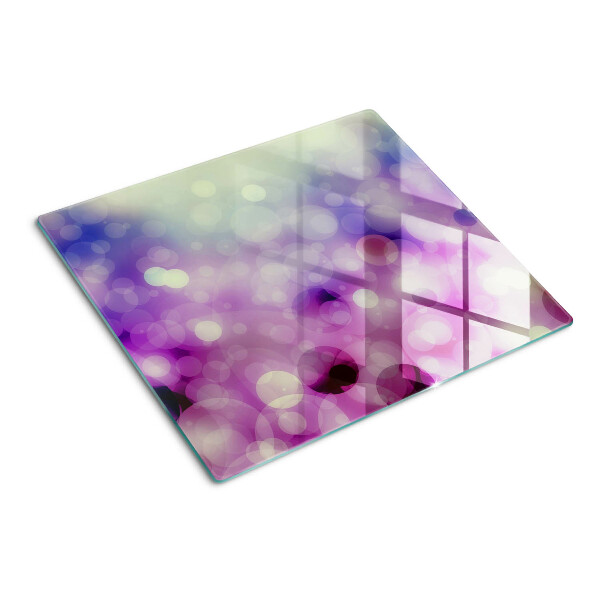 Planche à découper en verre Bokeh dans les tons violet et rose