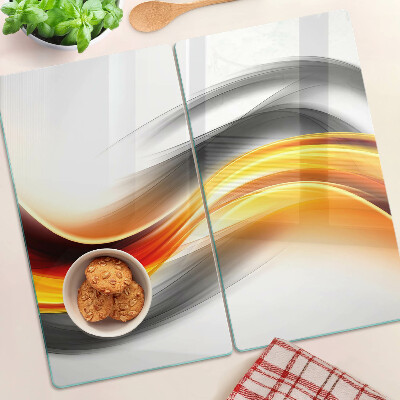Planche à découper verre Vagues en orange et noir
