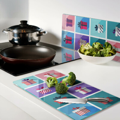 Planche à découper verre Motifs cadeaux de différentes couleurs