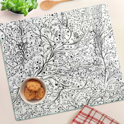 Planche à découper verre Un motif végétal aux branches délicates