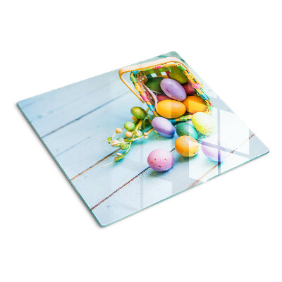 Planche à découper en verre Oeufs de Pâques colorés dans un panier