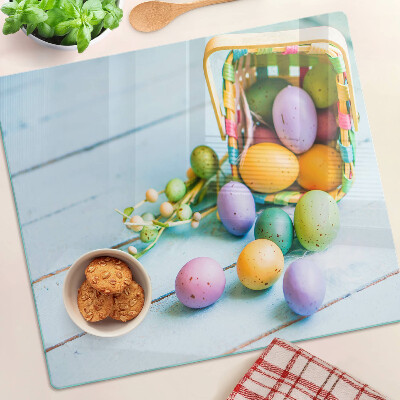Planche à découper en verre Oeufs de Pâques colorés dans un panier