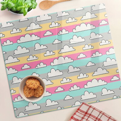 Planche à découper verre Nuages sur fond pastel