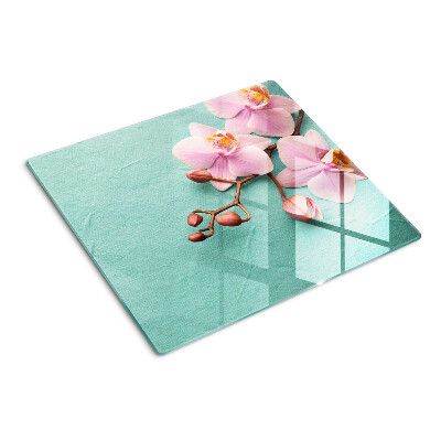 Planche à découper en verre Orchidées sur fond bleu