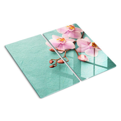 Planche à découper en verre Orchidées sur fond bleu
