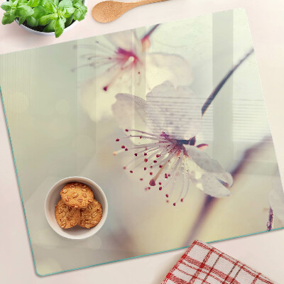 Planche à découper en verre Fleurs sur fond géométrique