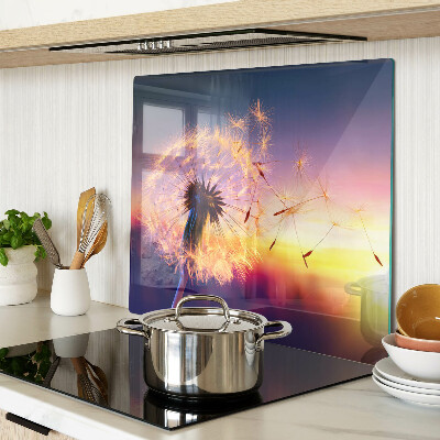 Planche à découper verre Pissenlits contre le coucher du soleil