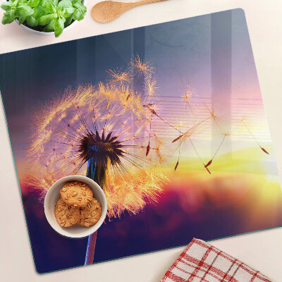 Planche à découper verre Pissenlits contre le coucher du soleil