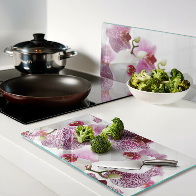 Planche à découper verre Orchidées devant la fenêtre