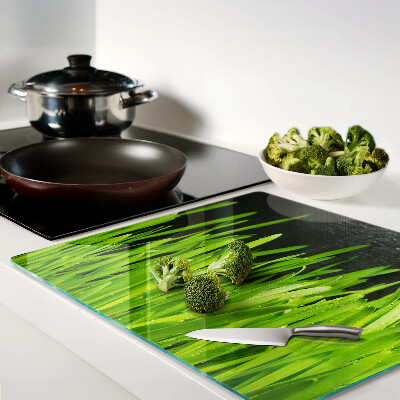 Planche à découper verre Herbe verte avec des gouttes d'eau