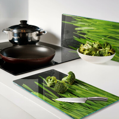 Planche à découper verre Herbe verte avec des gouttes d'eau