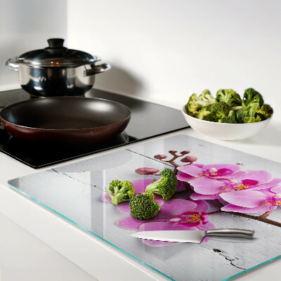 Planche à découper verre Orchidées sur fond blanc