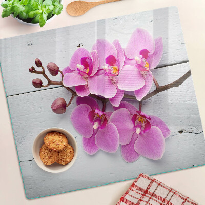 Planche à découper verre Orchidées sur fond blanc