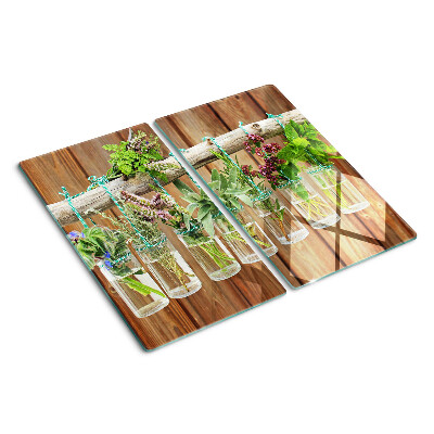 Planche à découper en verre Herbes en pots sur fond de bois