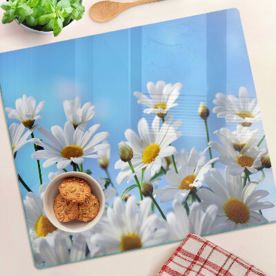 Planche à découper en verre Fleurs de marguerite sur fond bleu