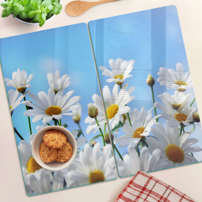 Planche à découper en verre Fleurs de marguerite sur fond bleu
