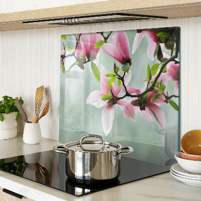 Planche à découper en verre Fleurs de magnolia sur fond de verdure