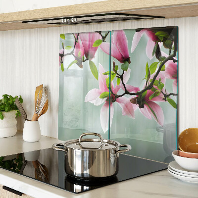 Planche à découper en verre Fleurs de magnolia sur fond de verdure