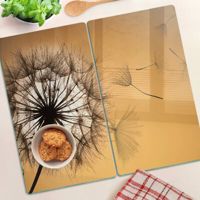 Planche à découper en verre Pissenlits contre le coucher du soleil
