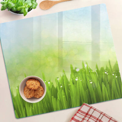 Planche à découper verre Herbe verte avec des gouttes d'eau
