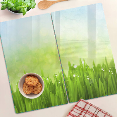 Planche à découper verre Herbe verte avec des gouttes d'eau