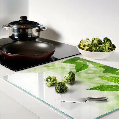 Planche à découper verre Feuilles sur fond vert flou