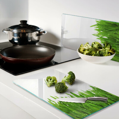 Planche à découper verre Herbe verte avec des gouttes d'eau