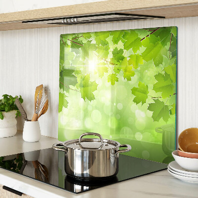 Planche à découper en verre Feuilles aux rayons du soleil