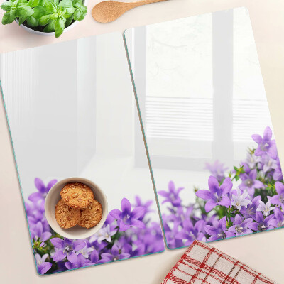 Planche à découper en verre Fleurs violettes en arrière-plan
