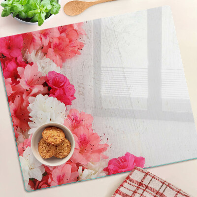 Planche à découper verre Fleurs dans les tons de rose et de blanc
