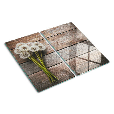 Planche à découper en verre Fleurs de pissenlit sur fond de bois