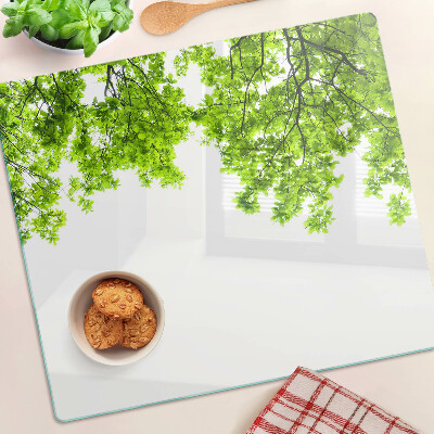 Planche à découper en verre Feuilles vertes contre le ciel