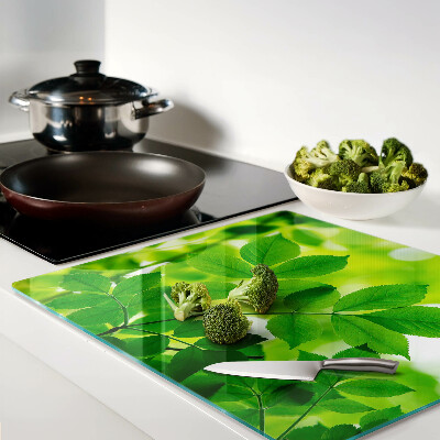 Planche à découper verre Feuilles sur fond vert
