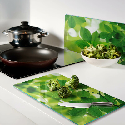 Planche à découper verre Feuilles sur fond vert