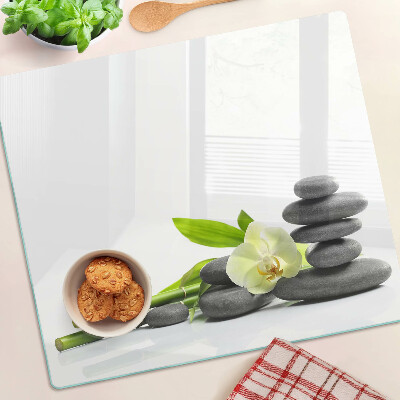 Planche à découper en verre Orchidée et pierres de spa