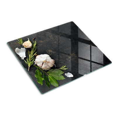 Planche à découper verre Fleurs et herbes sur fond de marbre