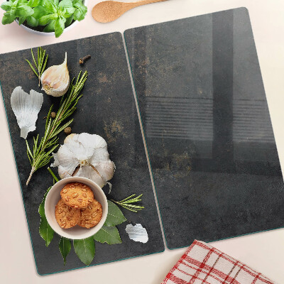 Planche à découper verre Fleurs et herbes sur fond de marbre