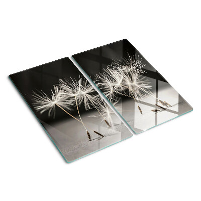 Planche à découper en verre Pissenlits duveteux sur un fond monochrome