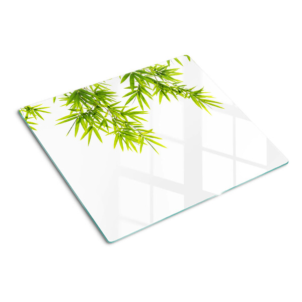 Planche à découper verre Feuilles de bambou sur le fond de la fenêtre