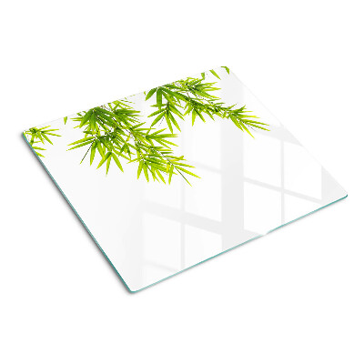 Planche à découper verre Feuilles de bambou sur le fond de la fenêtre