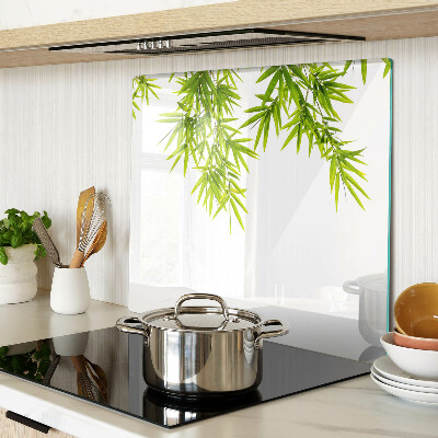 Planche à découper verre Feuilles de bambou sur le fond de la fenêtre