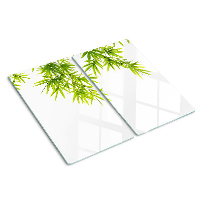 Planche à découper verre Feuilles de bambou sur le fond de la fenêtre