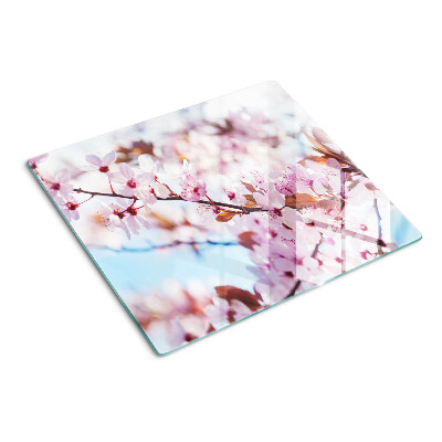 Planche à découper en verre Fleurs de cerisier sur fond bleu