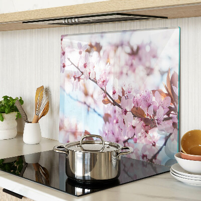 Planche à découper en verre Fleurs de cerisier sur fond bleu