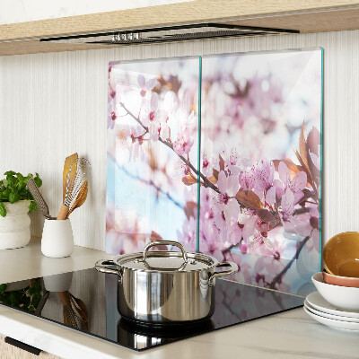 Planche à découper en verre Fleurs de cerisier sur fond bleu