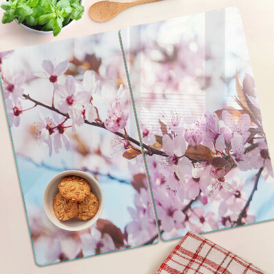 Planche à découper en verre Fleurs de cerisier sur fond bleu