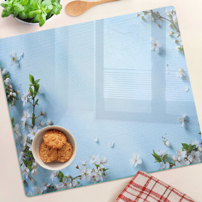 Planche à découper verre Motif floral sur fond bleu