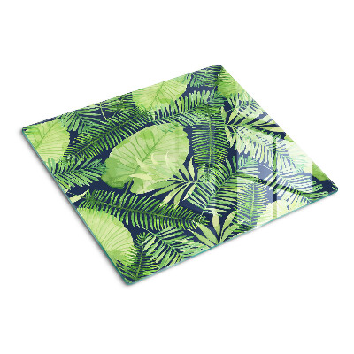 Planche à découper verre Feuilles tropicales sur fond sombre