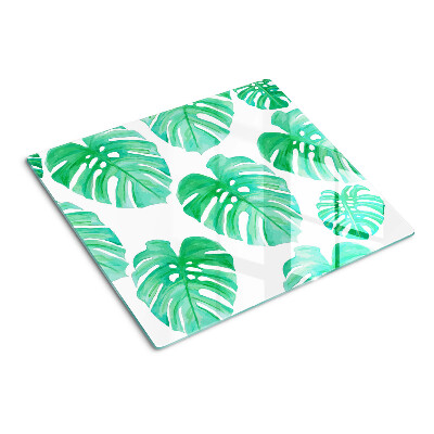 Planche à découper en verre Feuilles de Monstera sur fond blanc