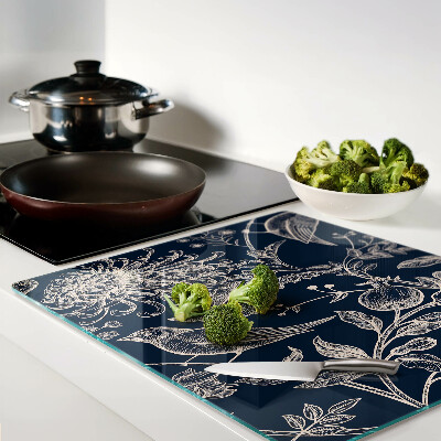 Planche à découper verre Fleurs et oiseaux sur fond sombre